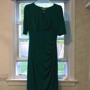 Dress peephole with gold button